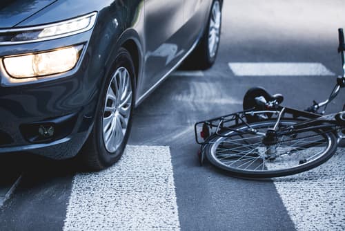 bicycle in crosswalk after collision with a vehicle